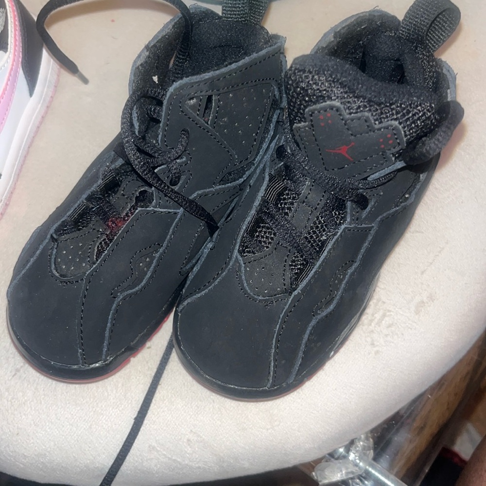 GUC baby black Jordans.